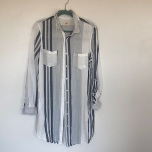 Long button shirt. Thread + supply size medium. White with blue lines.